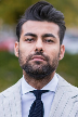 man in white and black pinstripe suit jacket
